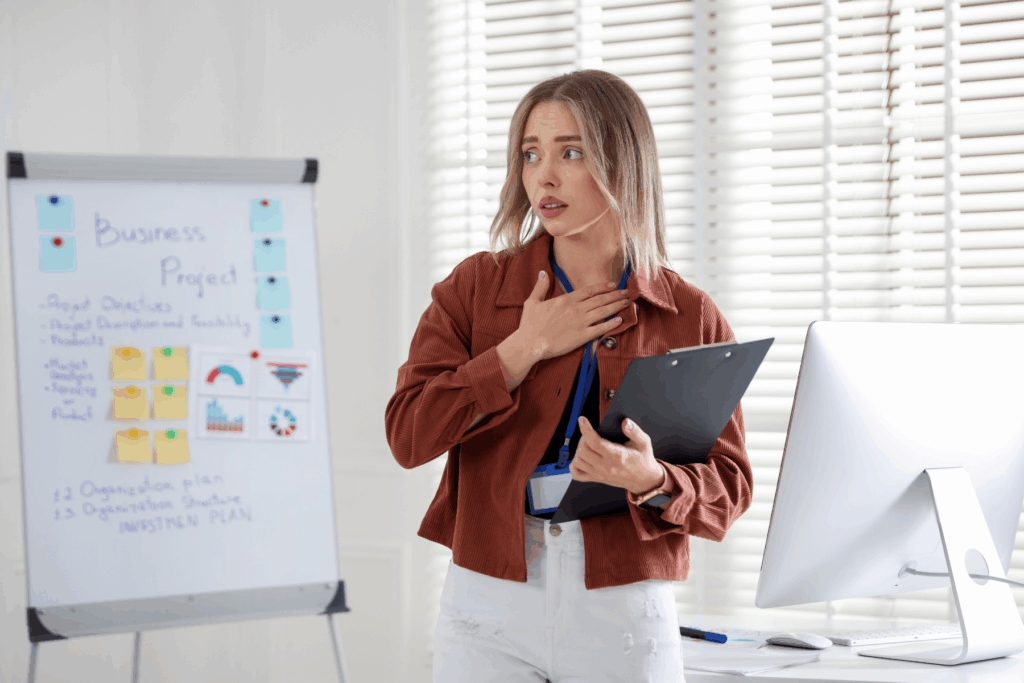 A woman is hit with a wave of social anxiety before giving a presentation.